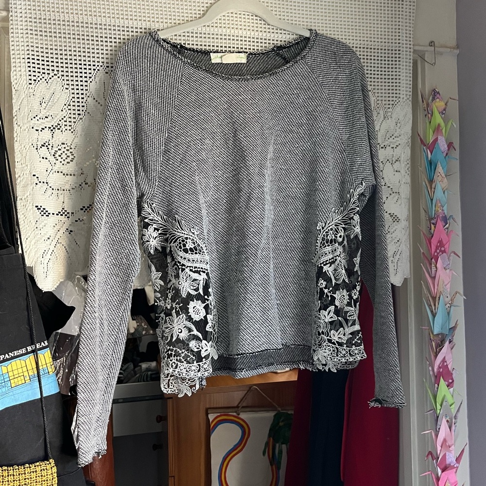 lace-paneled knit top